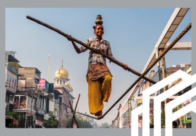A young tightrope walker balances on a rope with a pole and a pot on her head, in Old Delhi, India. To illustrate a rebalancing of the ratings as lower-income nations are narrowing the gap on wealthier competitors A young tightrope walker balances on a rope with a pole and a pot on her head, in Old Delhi, India. To illustrate a rebalancing of the ratings as lower-income nations are narrowing the gap on wealthier competitors