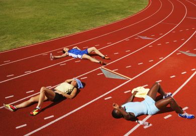 Tired runner lie on the track, illustrating a lack of resilience