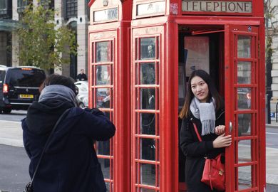 Tourist in a phone box