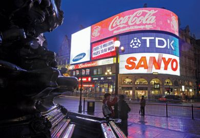 Tourists visiting Piccadilly Circus, London