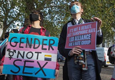 Transgender Action Block activists and supporters protest outside the first annual conference of the LGB Alliance in October 2021 in London