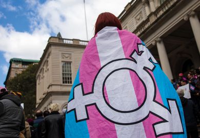 Person with transgender flag