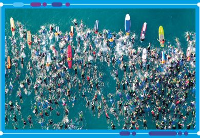 Aerial view of an iron man swimming event, to illustrate the shifts in positions of universities in the World University Rankings Aerial view of an iron man swimming event, to illustrate the shifts in positions of universities in the World University Rankings