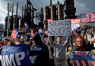 Donald Trump supporters demonstrate at SteelStacks on 15 April 2019 in Bethlehem, Pennsylvania. One person holds a sign stating “socialism sucks”. To illustrate the rise of right-wing populism.