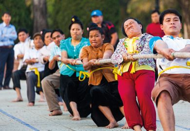 Vietnam, Dien Bien Phu, tug of war game Vietnam, Dien Bien Phu, tug of war game to illustrate Vietnam frustrating German transplant