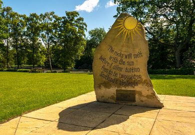 Sculpture, Heriot-Watt University campus, Edinburgh, Scotland, UK, with quote by Alex Salmond “The rocks will melt with the sun before I allow tuition fees to be imposed on Scotland’s students”.
