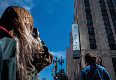 A partially removed sign at Twitter headquarters in San Francisco, California, US, on Wednesday, July 26, 2023. Elon Musk has changed Twitter Inc.'s logo, replacing its signature blue bird with a stylized X