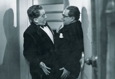 Two men stuck in doorway Two men stuck in doorway