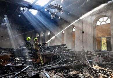 Firefighters in a ruined Zaporizhzhia National University building after a Russian drone attack in September Firefighters in a ruined Zaporizhzhia National University building after a Russian drone attack in September