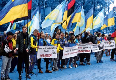 Students and teachers of Ivan Poddubny Olympic College protest about merge of the academic institution and the National University of Physical Education and Sport outside the Cabinet of Ministers building, Kyiv, 2020