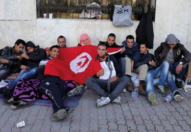 Unemployed people outside Tunisian Ministry of Vocational Training and Employment