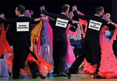 University-branded ballroom dancers dancing