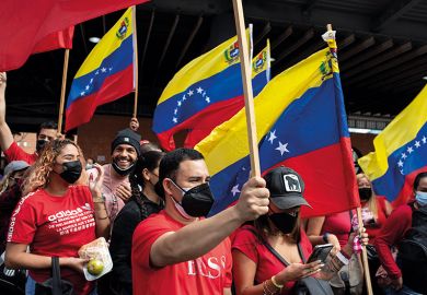 Supporters of Nicolas Maduro participate in a rally on Youth Day 