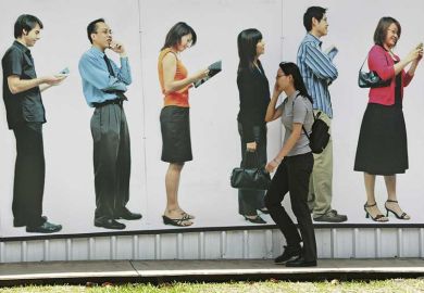 walking-past-queue-on-phone