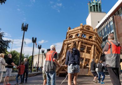 Volunteers help with the demolition of the 'Monumental Construction' - a 45ft (14 metre) cardboard building created by French visual artist Olivier Grossetete Volunteers help with the demolition of the 'Monumental Construction' - a 45ft (14 metre) cardboard building created by French visual artist Olivier Grossetete to illustrate Top UK laboratories adjust as Wellcome Trust cuts core funding