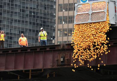  Rubber ducks are dropped into the Chicago River to illustrate Mounting debt poses threat to mission, Chicago warned