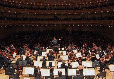 Belgrade Philharmonic Orchestra performing at Carnegie Hall to illustrate Amplifying the ensemble
