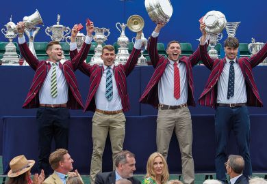 Line of winners holding up their trophies to illustrate Oxford Covid vaccine windfall outweighs rest of sector IP income