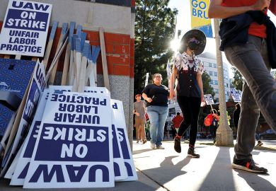 Union academic workers and supporters march at the UCLA campus as described in the article