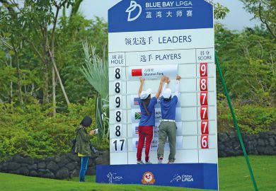 Scorers make a change on a scoreboard in Hainan Island, China Scorers make a change on a scoreboard in Hainan Island, China to illustrate ‘Up-or-out’ systems heap pressure on junior academics in China