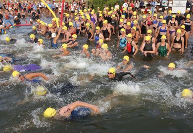 Over 2,300 people swim out to the sea as they take part in the Danskin Women's Triathlon Series to illustrate Mass resignations from diamond journal over £2,500 author fees