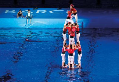 Castellers raise a castel in the middle of the swimming pool to illustrate Research refocus  ‘risks elite domination’