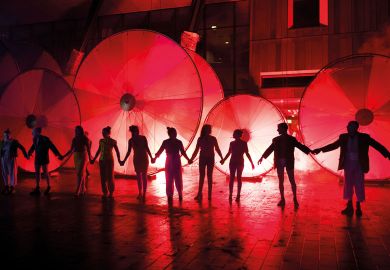 Performers holding hands ready for final bow to illustrate Drama college closure spotlights struggle for acting courses