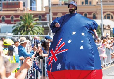  Man in inflated costume with an Australian flag to illustrate Some Australian campuses ‘earn more from locals than foreigners’