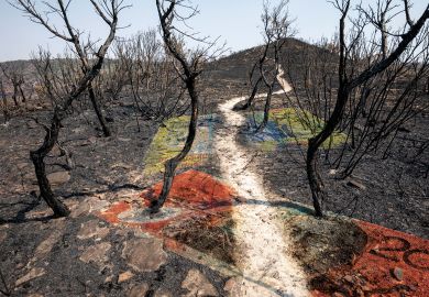 Concept of bank notes over over dried out  earth in the Blue Mountains, New South Wales, Australia to illustrate How should Australia address students’ cost-of-living crisis?