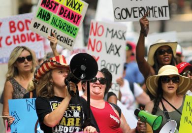 Anti-vaccine and anti-mask mandate protesters shouting holding banners in Massachusetts Anti-vaccine and anti-mask mandate protesters shouting holding banners in Massachusetts as Biden threatens to withhold funding from colleges over vaccines