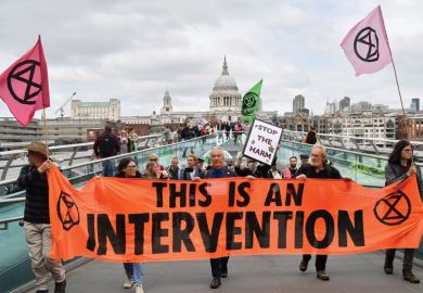 Climate activists from the Extinction Rebellion group cross the Millennium bridge as a metaphor for How I became a climate activist