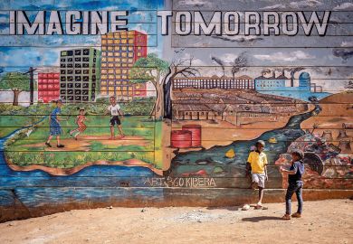 Children stand in front of a mural in Kibera slum illustrating an illustration of  today and tomorrow to illustrate Commonwealth can act as ‘a laboratory for change’