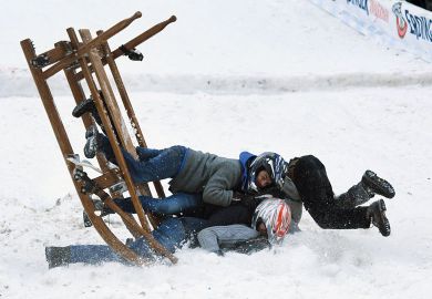 Participants of a sledge race fall in Garmisch-Partenkirchen, southern Germany Participants of a sledge race fall in Garmisch-Partenkirchen, southern Germany to illustrate EU drops limit on fixed-term contracts but sector concerns remain