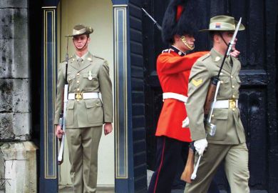 A member of Australia's Federation Guard mans the sentry box with two other guards marching away, one also an Australia's Federation Guard the other a British Grenadier Guard, as a metaphor for Australian institutions changing guard.