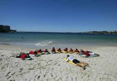 Students taking part in a surf awareness course in Australia at Bondi Beach to illustrate Supervisor’s support ‘crucial’ to novice academics’ well-being