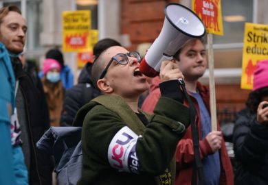 A protester speaks through a megaphone during the demonstration A protester speaks through a megaphone during the demonstration to illustrate Can UCU get the vote out for sector-wide UK strike?