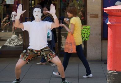 A mime artist, Cambridge, UK to illustrate OfS register pause ‘will make sector financial problems worse’