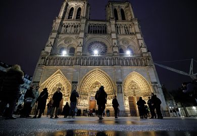People arrive to attend a second mass, open to the public, at the Notre-Dame de Paris cathedral to illustrate The experts who brought Notre-Dame back to life