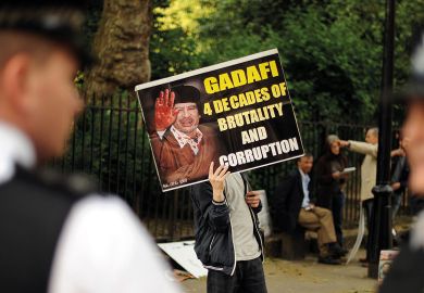 Protesters opposed to Libyan leader Moamer Kadhafi demonstrate outside of the London School of Economics to illustrate English sector ‘won’t be open on foreign donations unless forced’