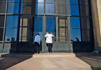 Visitors look inside the closed Philadelphia Museum of Art  Visitors look inside the closed Philadelphia Museum of Art to illustrate Private US college closures look to gain public attention
