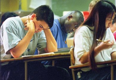 Students taking an admissions test to illustrate the admissions tests hinder disabled students, US audit finds