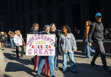 Detractors of President-elect Donald Trump protest against his planned immigration policies to illustrate Colleges on defensive as Trump stirs international student fears