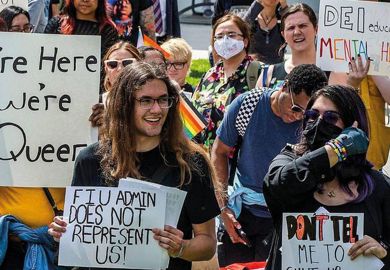 A group of Florida International University students students, staff and community members protest against Governor Ron DeSantis and the Florida Legislature  A group of Florida International University students students, staff and community members protest against Governor Ron DeSantis and the Florida Legislature  to illustrate US campuses largely escape partisan hits on tenure and teaching