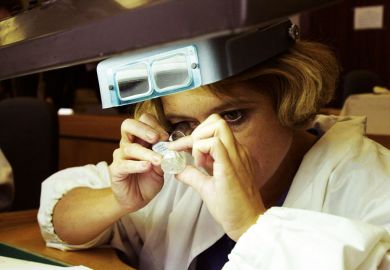 A sorter inspects a 143-carat Russian diamond A sorter inspects a 143-carat Russian diamond for France to back not-for-profit diamond journals