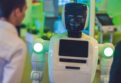 Man talking with a robot to illustrate ChatGPT assessed as ‘powerful tool for education if used correctly’