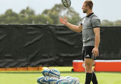 Braydon Ennor of the All Blacks throws a ball into the air chosen from a pile of balls on the ground  to illustrate Vice-chancellors ‘should be university community’s choice’ 