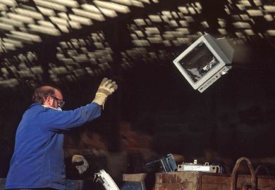  Scrap yard of computers for salvage of gold from integrated circuits.to illustrate Slash wasteful IT spend and invest in academics instead – expert