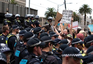 Police hold back counter-protesters at a Trans Exclusionary Radical Feminist (TERF) rally Police hold back counter-protesters at a Trans Exclusionary Radical Feminist (TERF) rally from event as described in the article