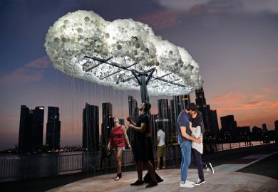 Cloud light art installation people walking with a honeymoon couple in front to illustrate Is  the honeymoon period over for liberal arts  in Asia?