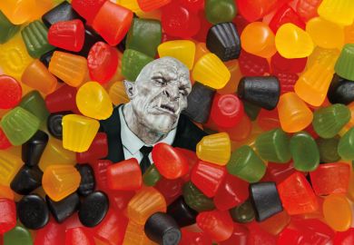 Trolls head surrounded by sweets Trolls head surrounded by sweets to illustrate Universities must help scholars targeted by trolls